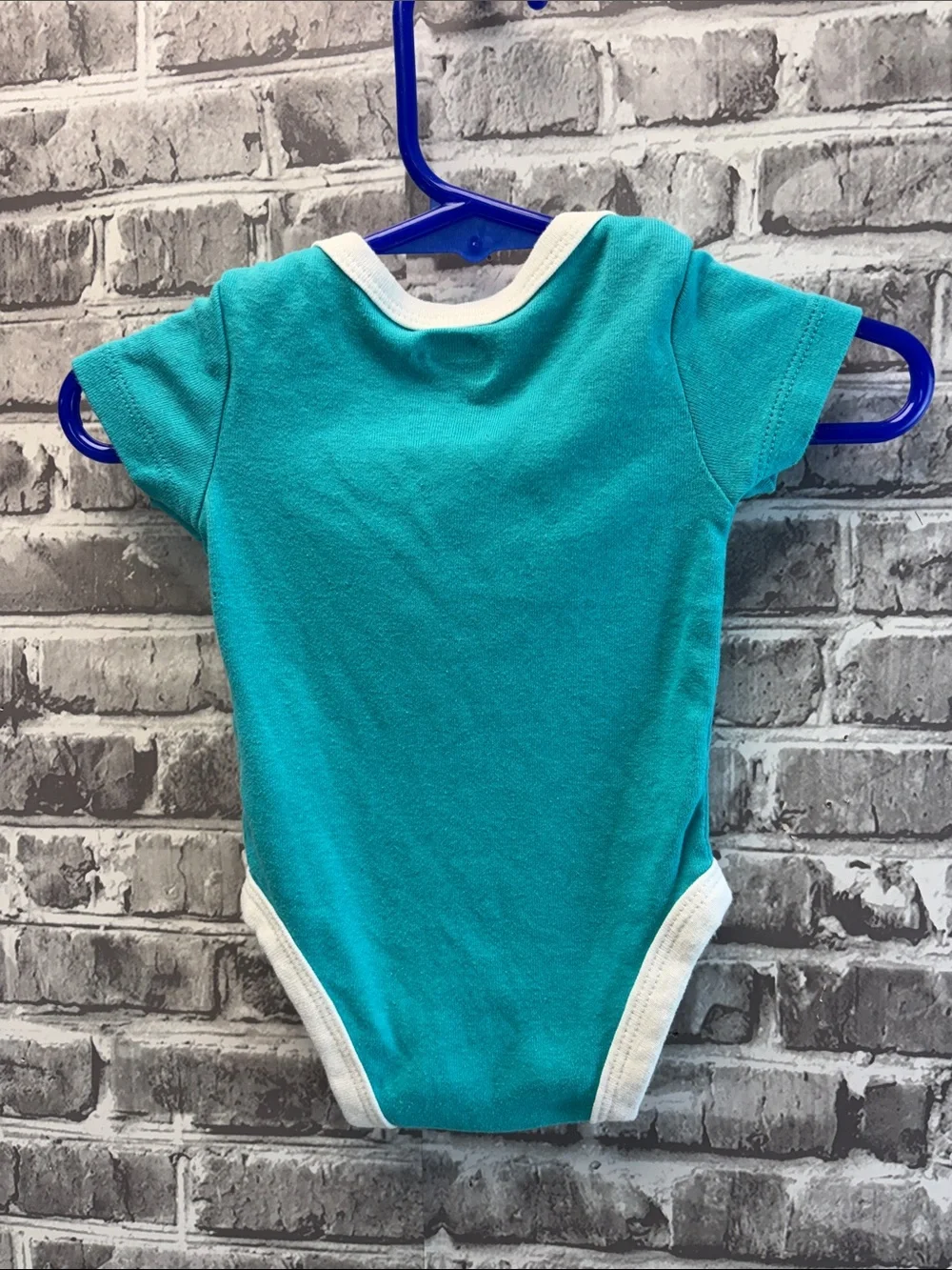 Nike Turquoise and White Baby Bodysuit with Navy Swoosh
